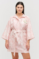 Profile view of model wearing the Oroton Garden Toile Embellished Tunic Dress in Peony and 100% silk for Women .