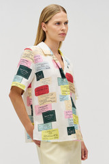 Profile view of model wearing the Oroton Invitation Print Camp Shirt in Multi and 100% linen for Women .