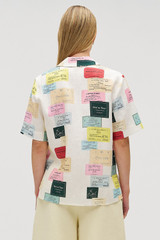 Profile view of model wearing the Oroton Invitation Print Camp Shirt in Multi and 100% linen for Women .