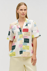 Profile view of model wearing the Oroton Invitation Print Camp Shirt in Multi and 100% linen for Women .