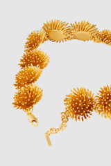 Detail product shot of the Oroton Urchin Necklace in Worn Gold and Premium brass material for Women .