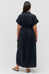 Profile view of model wearing the Oroton Rae Gathered Dress in North Sea and 100% cotton for Women .