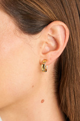 Profile view of model wearing the Oroton Carly Chain Link Hoops in Gold and  for Women .