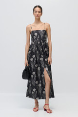 Profile view of model wearing the Oroton Graphic Dandelion Print Sundress in Black and 100% Silk Twill for Women .