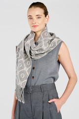 Profile view of model wearing the Oroton Harvey Signature Two Tone Scarf in Light Grey/Cream and 50% wool and 50% acrylic blend material for Women .