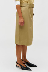 Profile view of model wearing the Oroton Belt Detail Trouser Skirt in Camel and 100% cotton material for Women .