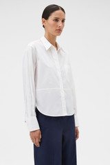 Profile view of model wearing the Oroton Crisp Poplin Shirt in White and 100% cotton fabric for Women .