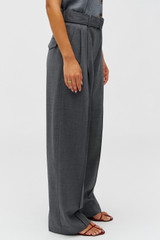 Profile view of model wearing the Oroton Belt Detail Pant in GRAPHITE and 100% wool material for Women .