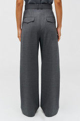 Profile view of model wearing the Oroton Belt Detail Pant in GRAPHITE and 100% wool material for Women .