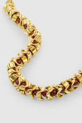 Detail product shot of the Oroton Wave Necklace in WORN GOLD/CHERRY and Premium brass material for Women .