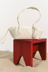 Detail product shot of the Oroton Breeze Baguette in Clotted Cream and Premium smooth leather for Women .