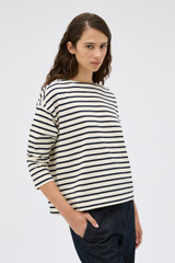 Profile view of model wearing the Oroton Stripe Market Tee in North Sea/Cream and 100% cotton fabric for Women .