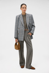 Profile view of model wearing the Oroton Check Man Style Blazer in Slate and 50% wool and 50% polyester blend fabric for Women . IP:2