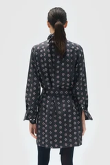 Profile view of model wearing the Oroton Foulard Print Dress in North Sea and 100% silk twill fabric for Women .