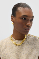 Profile view of model wearing the Oroton Asher Necklace in Worn Gold and  for Women .