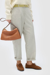 Profile view of model wearing the Oroton Arlo Railroad Pant in Khaki and 100% cotton fabric for Women .