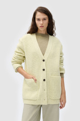 Profile view of model wearing the Oroton Oversized Manstyle Cardigan in Sorbet and 80% wool and 20% nylon fabric for Women . IP:4
