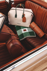 Detail product shot of the Oroton Voyager Weekender in Forest and Canvas material with leather trims for Women .