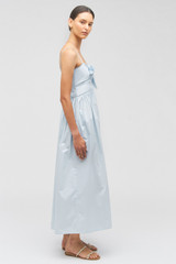 Profile view of model wearing the Oroton Lace Trim Sundress in Windmill Blue and 100% cotton for Women .