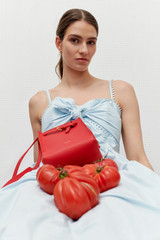 Profile view of model wearing the Oroton Lace Trim Sundress in Windmill Blue and 100% cotton for Women .