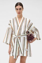 Profile view of model wearing the Oroton Fiesta Stripe Robe in Multi and 100% heavyweight linen fabric for Women . IP:2