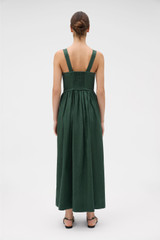Profile view of model wearing the Oroton Handkerchief Sundress in Ivy and 100% mid-weight linen fabric with a lightly textured surface for Women .