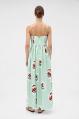 Profile view of model wearing the Oroton Folk Doilie Print Sun Dress in Mint and 100% silk fabric for Women .