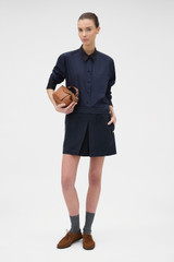 Profile view of model wearing the Oroton Crisp Poplin Shirt in NORTH SEA/BLACK and 100% cotton fabric for Women .