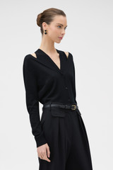 Profile view of model wearing the Oroton V-Detail Cardigan in BLACK and 100% fine gauge merino wool fabric for Women . IP:3