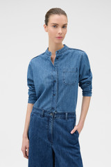 Profile view of model wearing the Oroton Denim Tie Neck Shirt in Denim and 100% cotton fabric for Women .