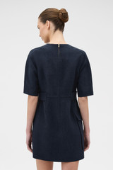 Profile view of model wearing the Oroton Button Detail Dress in NORTH SEA and 100% bonded heavy linen fabric for Women . IP:4