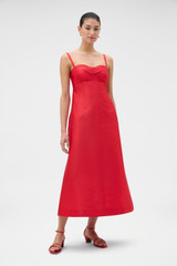 Profile view of model wearing the Oroton Sculptured Bodice Dress in POPPY and 85% polyester and 15% silk blend fabric for Women .