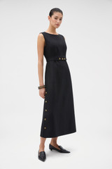 Profile view of model wearing the Oroton Button Detail Dress in BLACK and 100% heavyweight linen fabric for Women .
