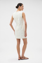 Profile view of model wearing the Oroton Broderie Trim Shift Dress in SOFT CREAM and 100% heavyweight linen fabric for Women .