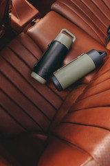 Detail product shot of the Oroton Frank Green x Oroton Grip Lid 595ML Bottle in Night Sky and Premium pebble leather for Men .