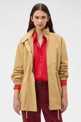 Profile view of model wearing the Oroton Arlo Washed Parka in Cashew and 100% cotton fabric for Women . IP:2