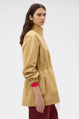 Profile view of model wearing the Oroton Arlo Washed Parka in Cashew and 100% cotton fabric for Women . IP:3