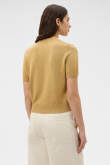 Profile view of model wearing the Oroton Cotton Short Sleeve Knit in Cashew and 100% cotton fabric for Women .