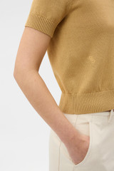 Profile view of model wearing the Oroton Cotton Short Sleeve Knit in Cashew and 100% cotton fabric for Women . IP:4