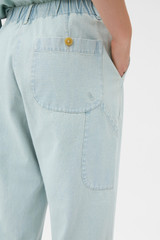 Profile view of model wearing the Oroton Arlo Carpenter Chino in Chambray and 100% cotton fabric for Women .