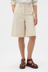 Profile view of model wearing the Oroton Cotton Bermuda in Calico and 100% cotton fabric for Women .