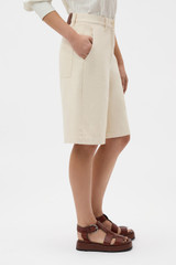 Profile view of model wearing the Oroton Cotton Bermuda in Calico and 100% cotton fabric for Women .
