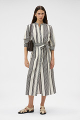 Profile view of model wearing the Oroton Weekend Stripe Dress in Calico and 100% cotton fabric for Women .