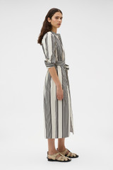 Profile view of model wearing the Oroton Weekend Stripe Dress in Calico and 100% cotton fabric for Women .