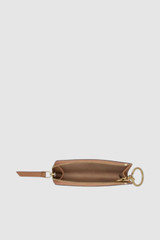 Internal product shot of the Oroton Eve Pouch With Key Ring in Tan and Pebble leather exterior for Women .