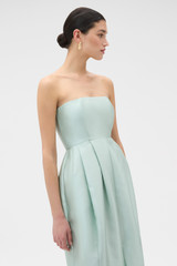 Profile view of model wearing the Oroton Bodice Detail Gown in Glass and 85% polyester and 15% silk blend fabric for Women .
