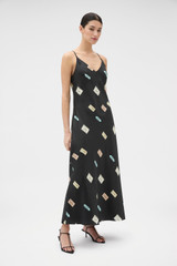 Profile view of model wearing the Oroton Vintage Label Slip Dress in Black and 100% silk twill fabric for Women . IP:3
