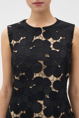 Profile view of model wearing the Oroton Poppy Lace Mini Dress in Black and 100% polyester fabric for Women . IP:4