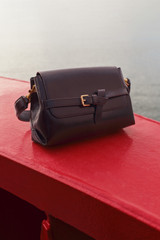 Detail product shot of the Oroton Margot Small Top Handle in Dark Chocolate and Premium pebble leather for Women .