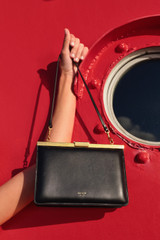 Detail product shot of the Oroton Icon Clutch in Black and Premium smooth leather for Women .